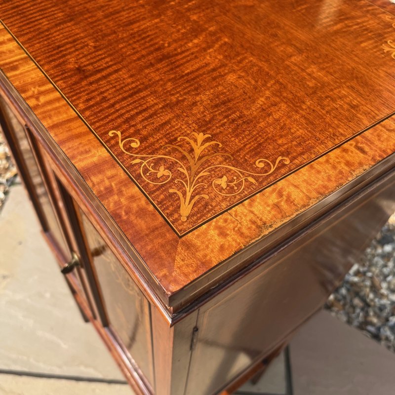 A Fine Quality Edwards and Roberts Of London marquetry inlaid music cabinet